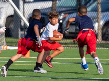 teens playing football